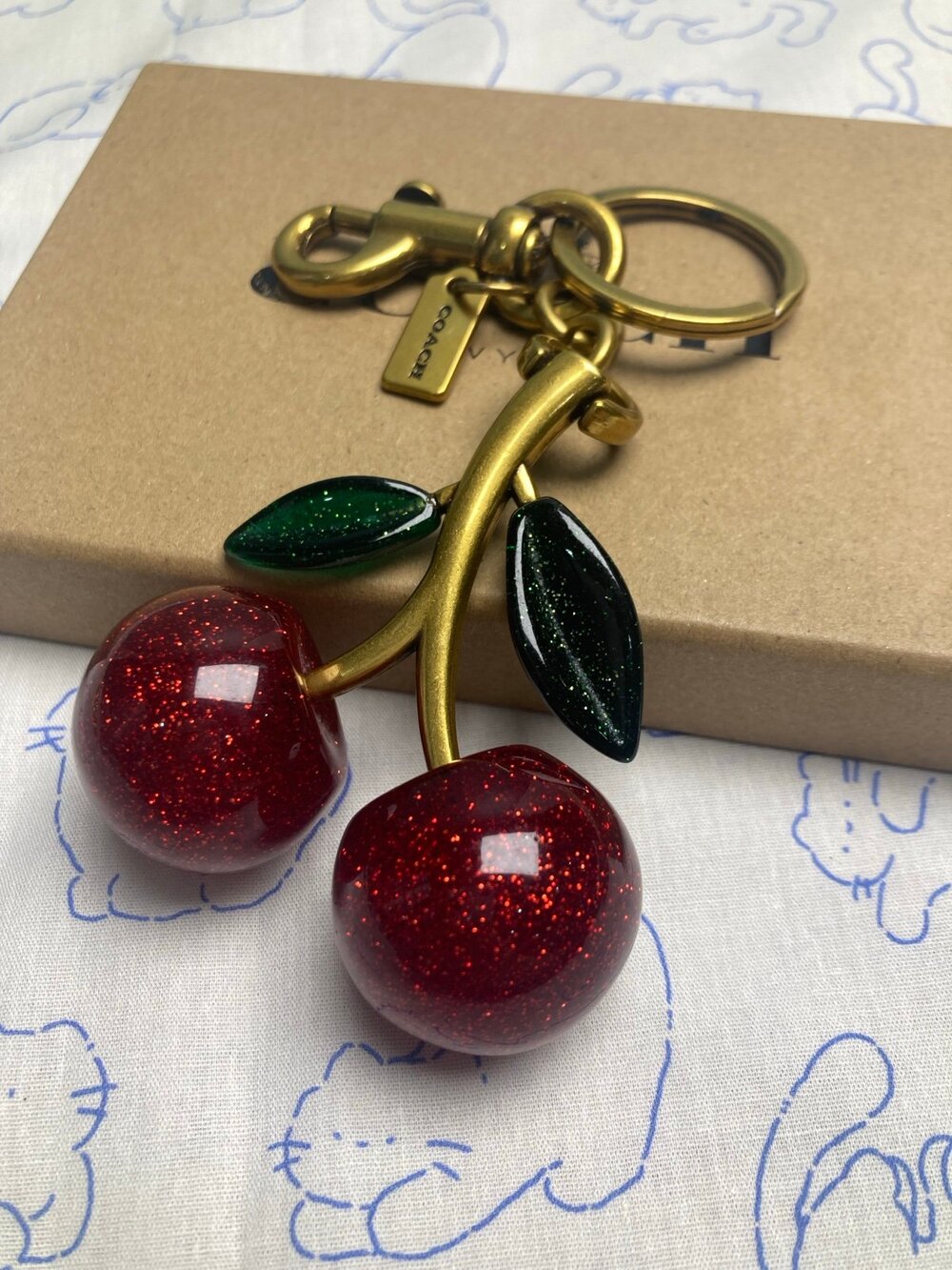 Coach Cherry Bag Charm Keychain Gold
